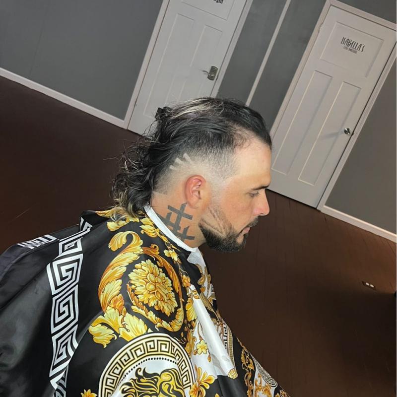 Professional fade with textured top styling by Taylor Corbett