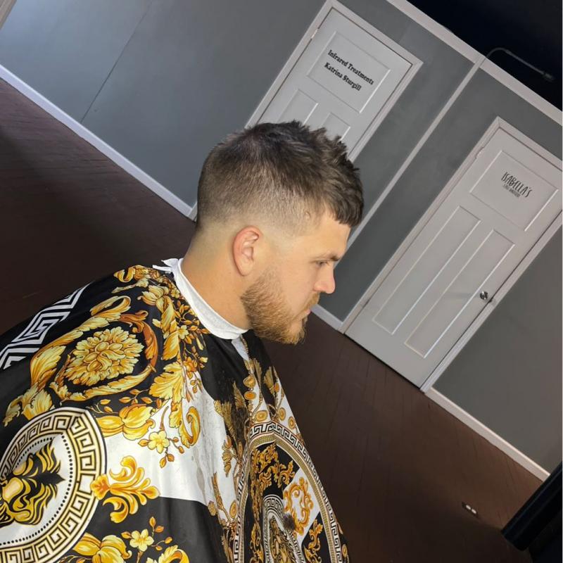 Clean skin fade haircut showcasing precision clipper work